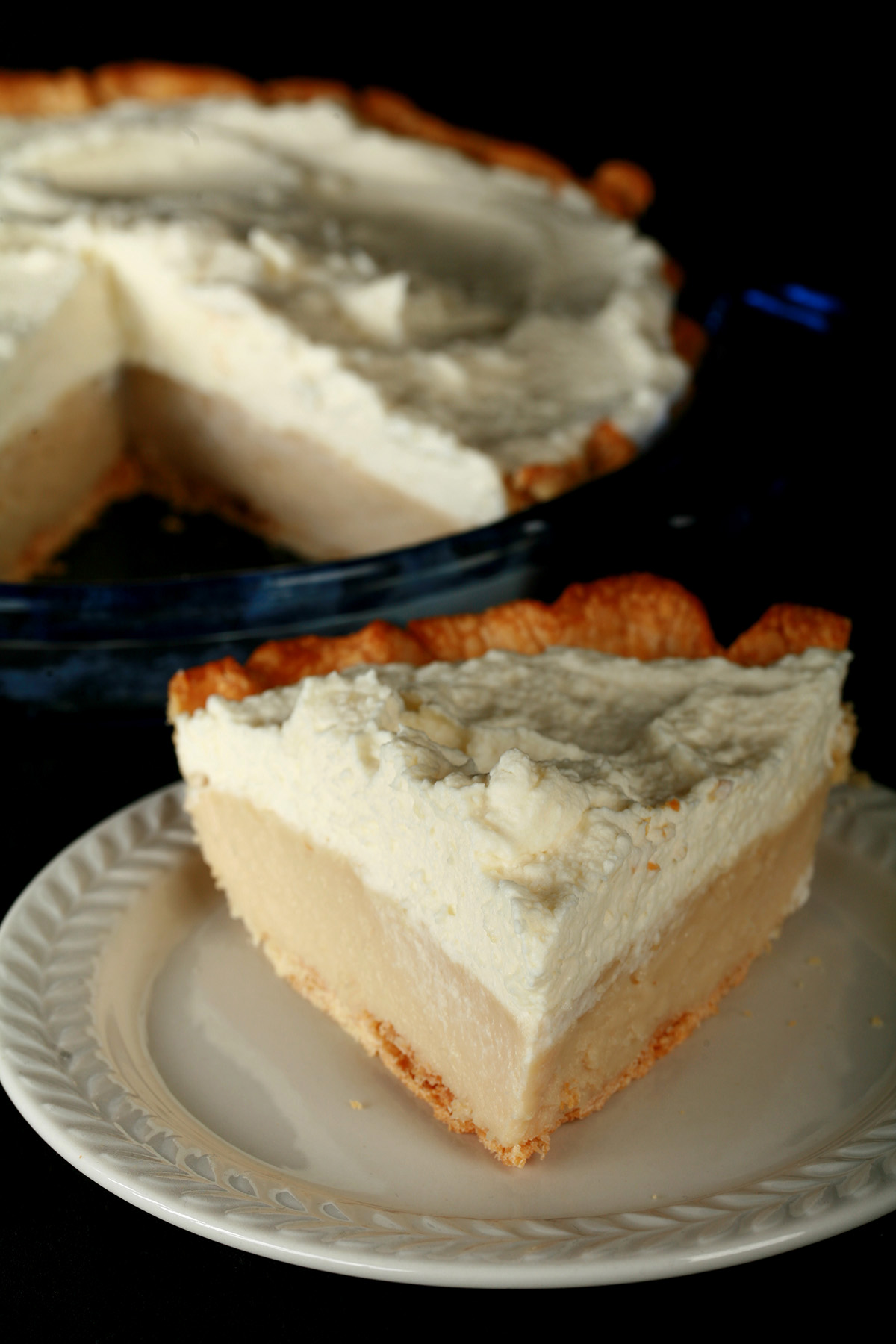 A Gluten-Free Earl Grey Pie - A greige custard pie, topped with whipped cream.