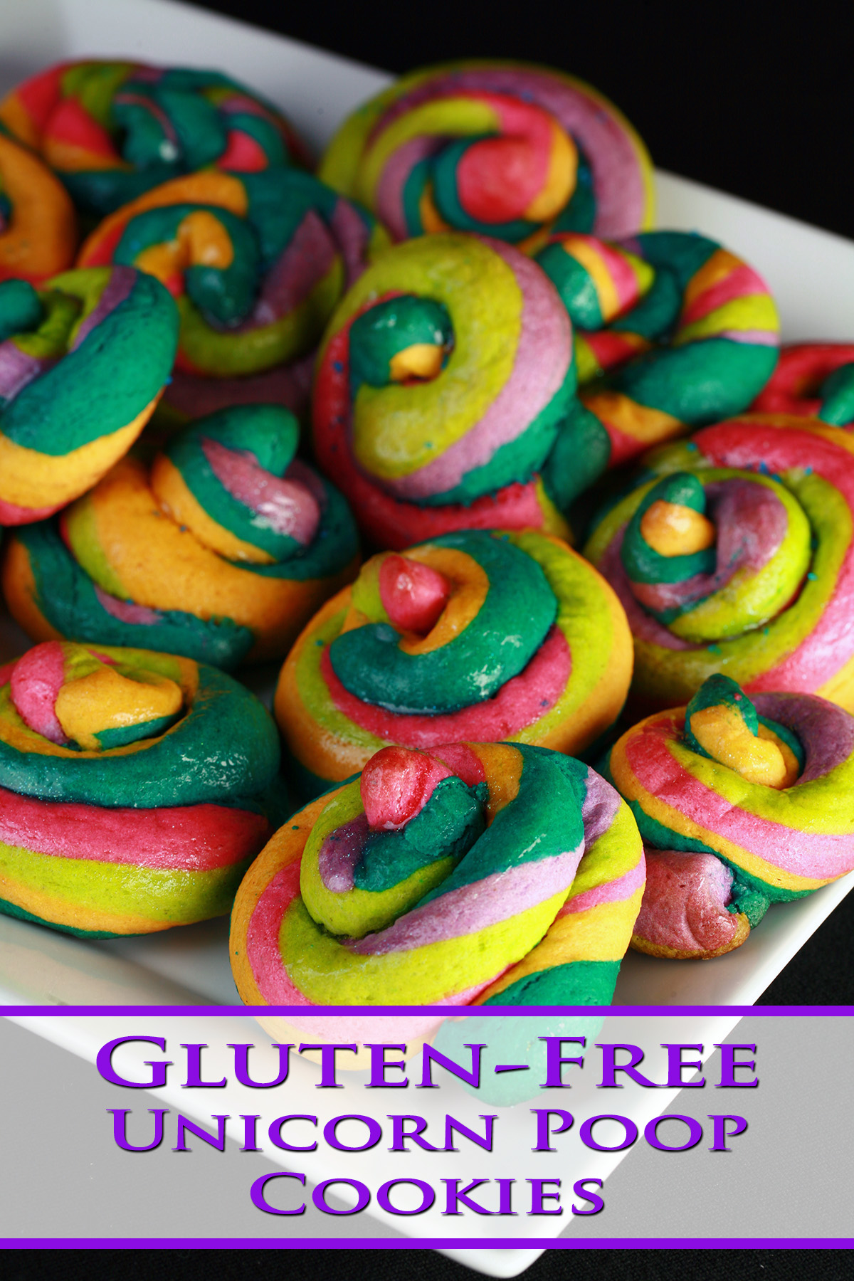 A close up view of a pile of gluten-free unicorn poop cookies.  They are brightly coloured cookie poops made from brightly coloured twists of cookie dough.