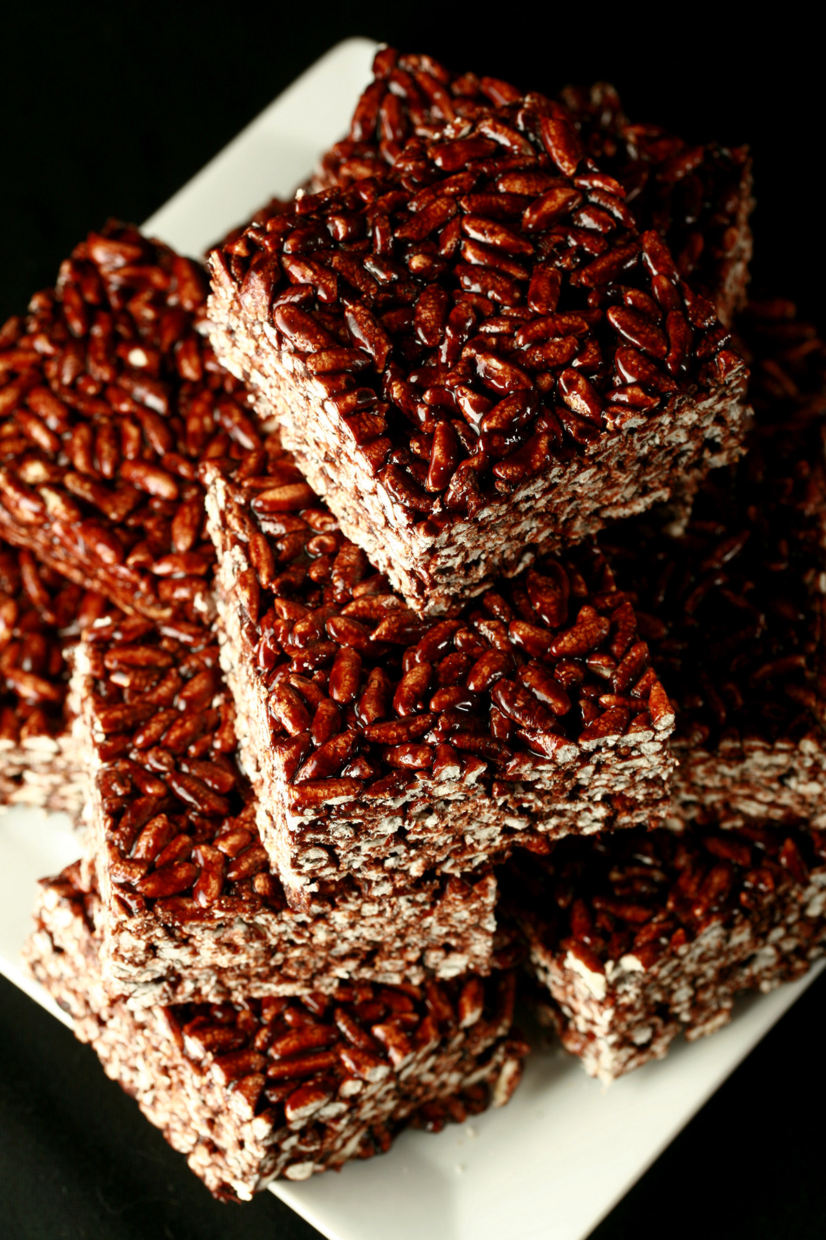 Gluten-Free Puffed Rice Bars, on a white square plate.
