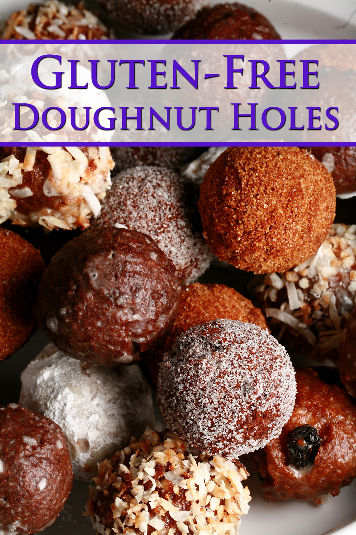 A close up view of an assortment of gluten-free doughnut holes: Toasted coconut, chocolate glazed, cinnamon sugar, powdered sugar, and dutchie versions are all visible.