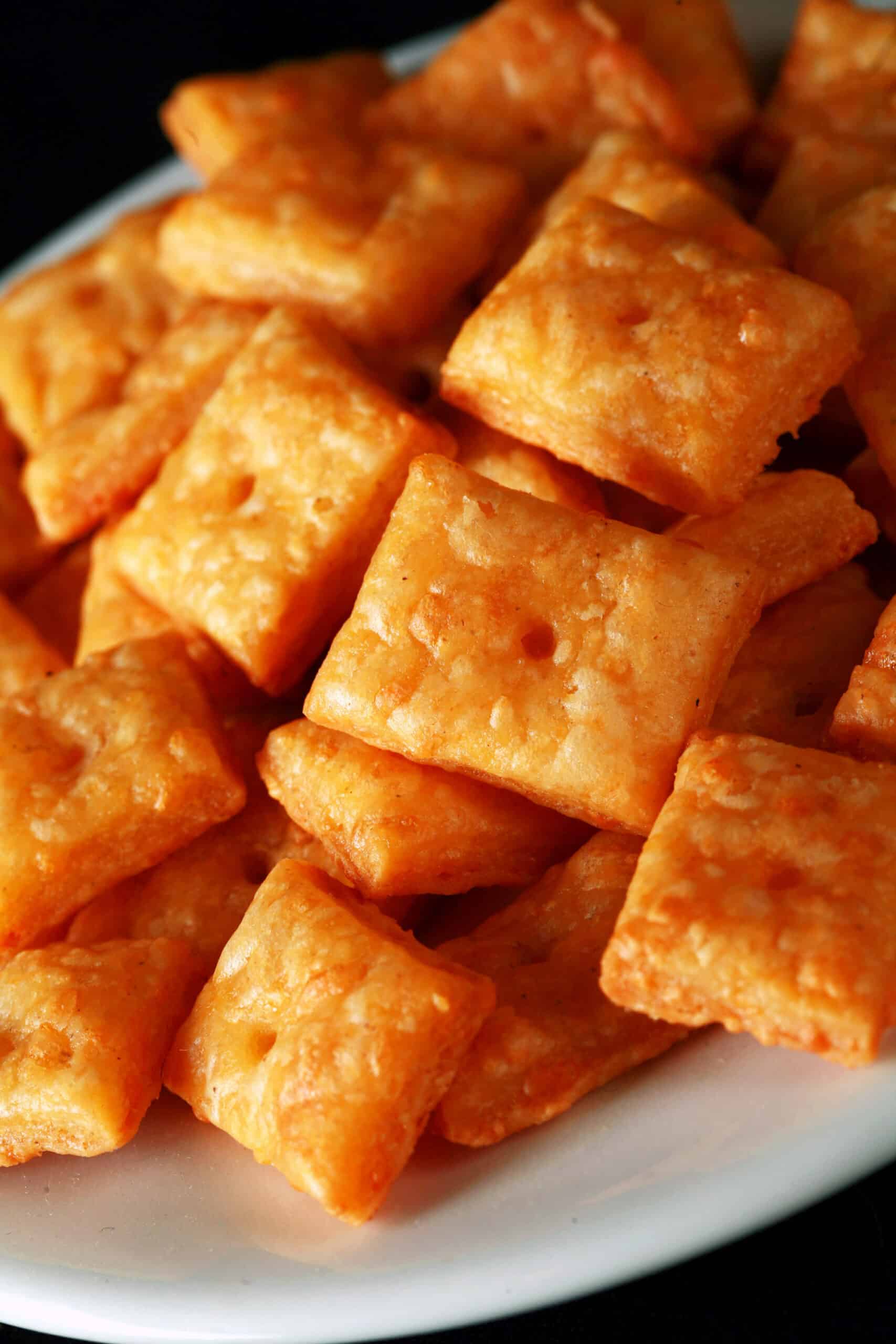 A plate of gluten free cheese its crackers.