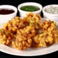 A plate of corn pakoras.