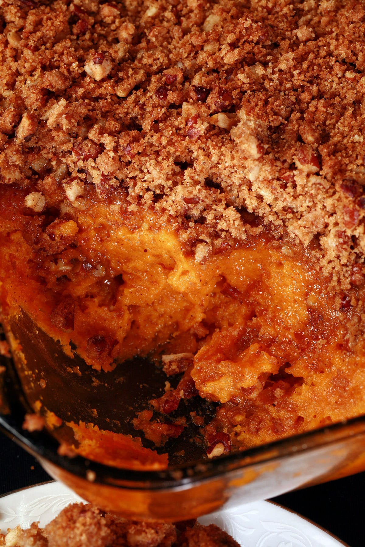A close up view of a pan of sweet potato souffle.