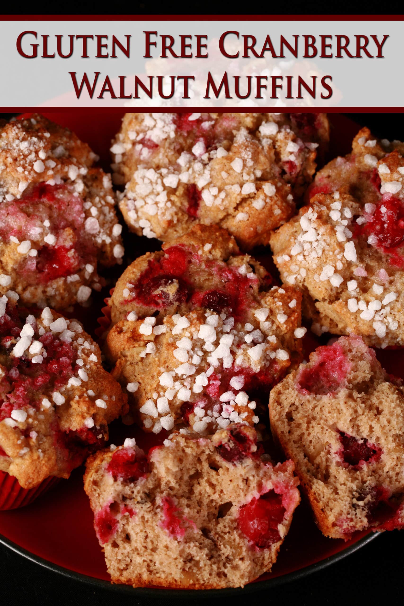 1 plate of gluten free cranberry walnut muffins with sugar crust on top.