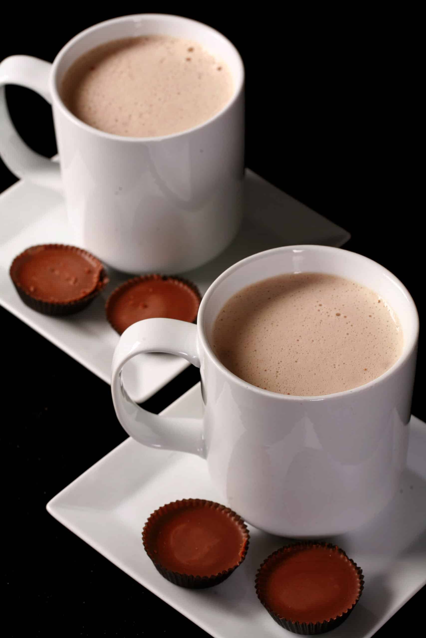 2 mugs of protein peanut butter cup hot chocolate.