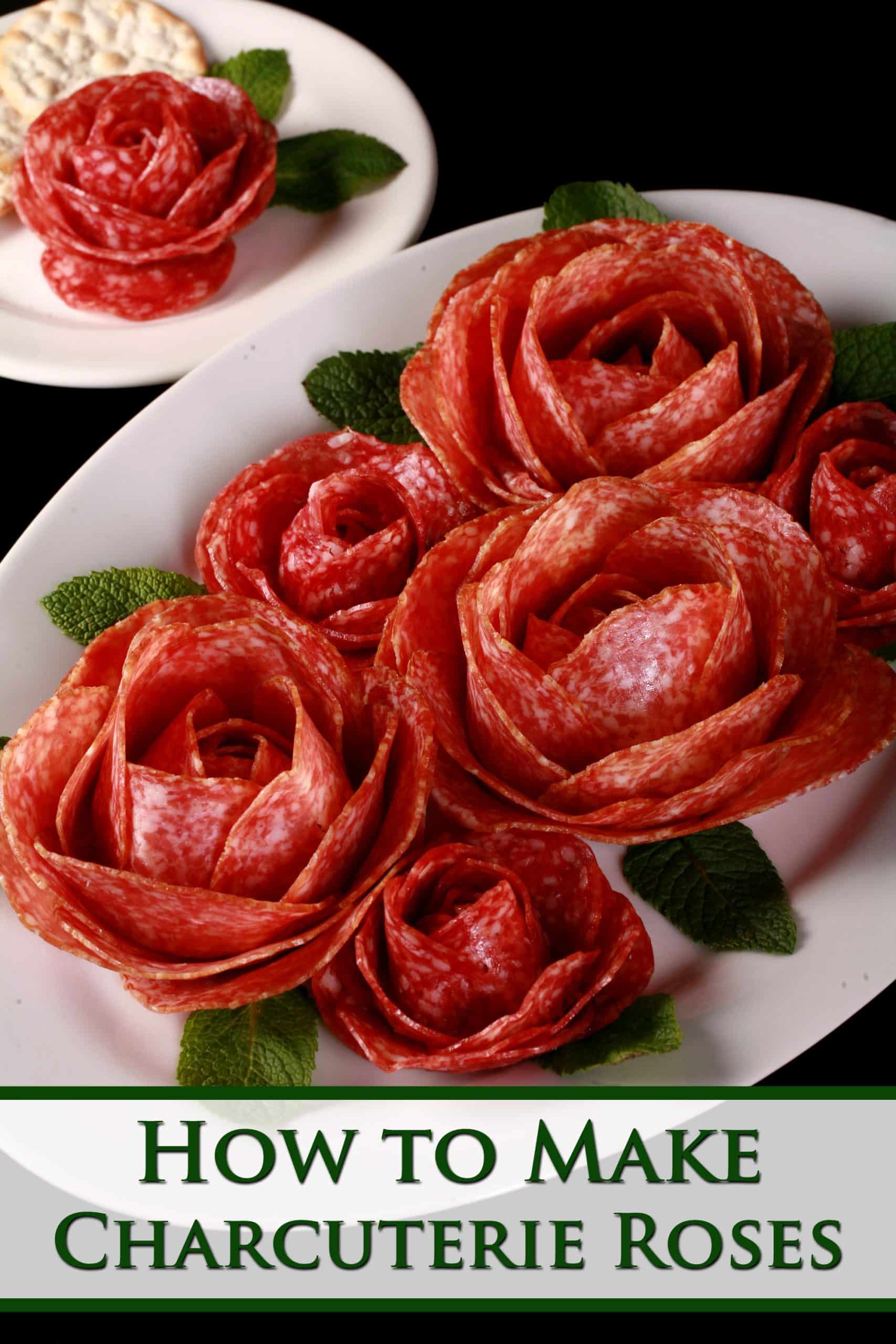 A plate of large and small salami roses, accented with mint leaves. Overlaid text says how to make charcuterie roses.