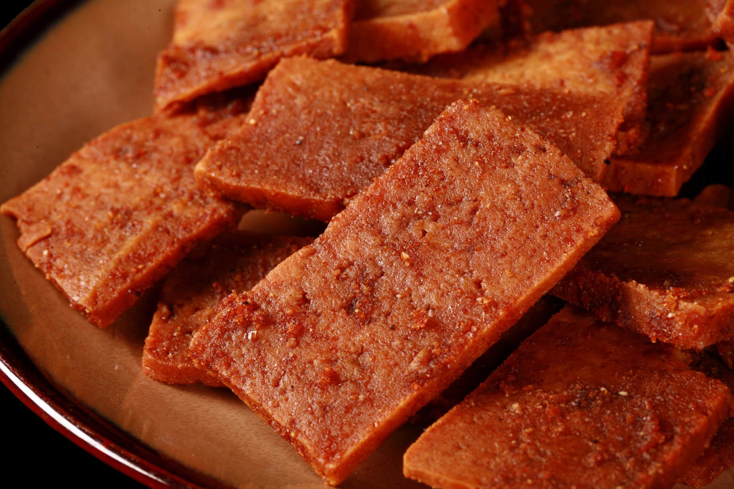 A plate of homemade vegan tofu jerky.