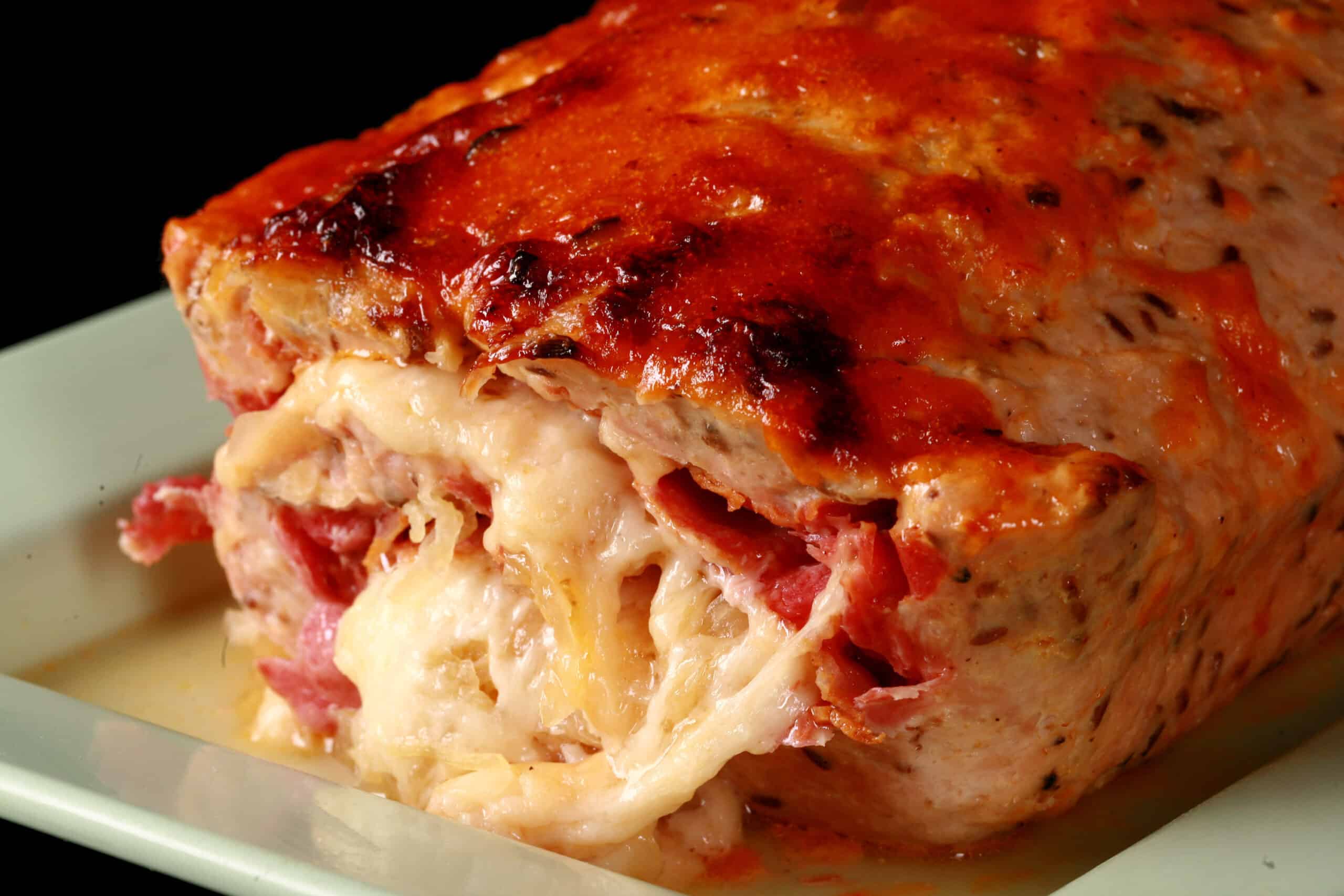 A whole Reuben Meatloaf on a serving platter.