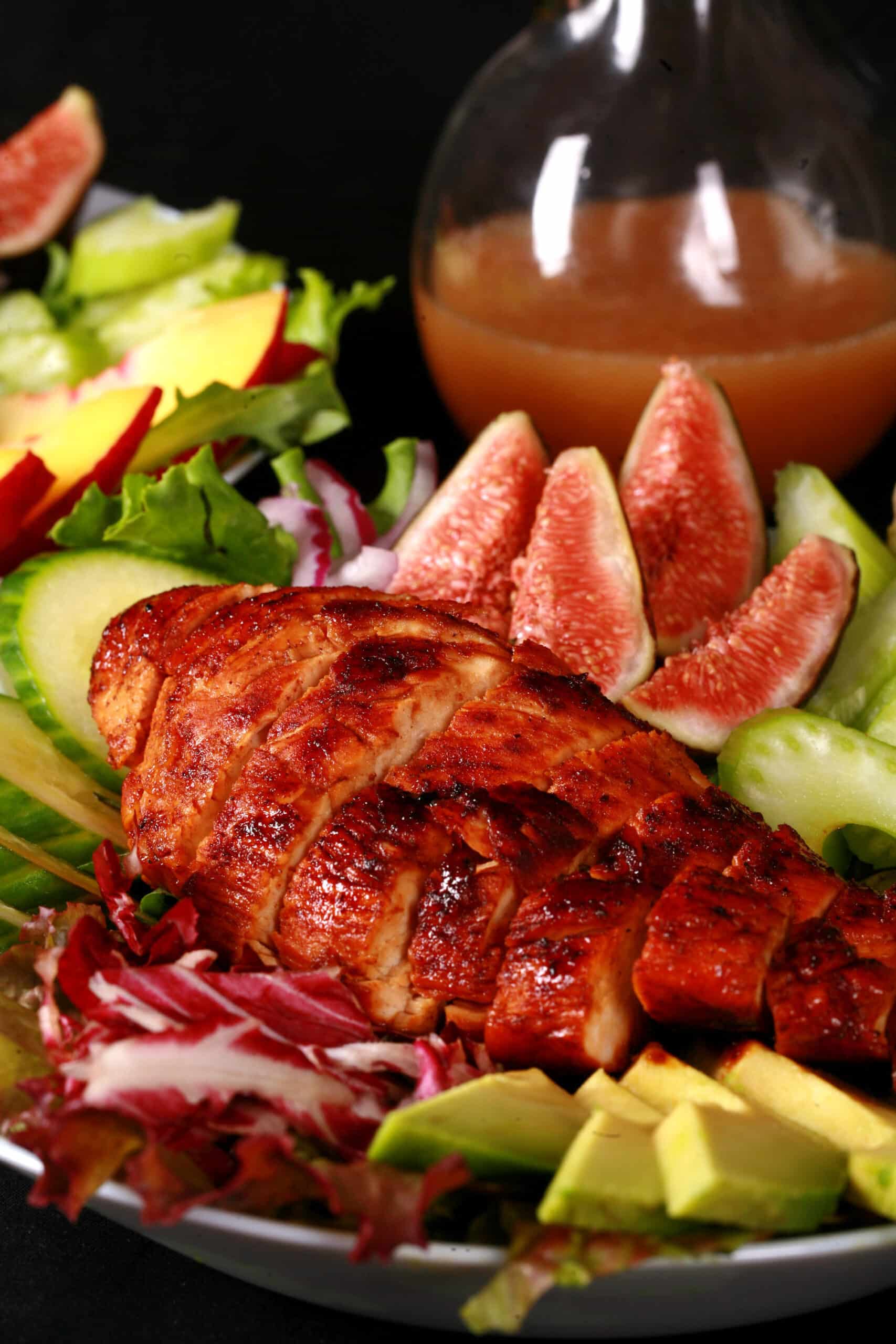 2 summer salads with peaches, figs, avocado, vegetables, and white peach balsamic vinegar glazed  chicken breast.