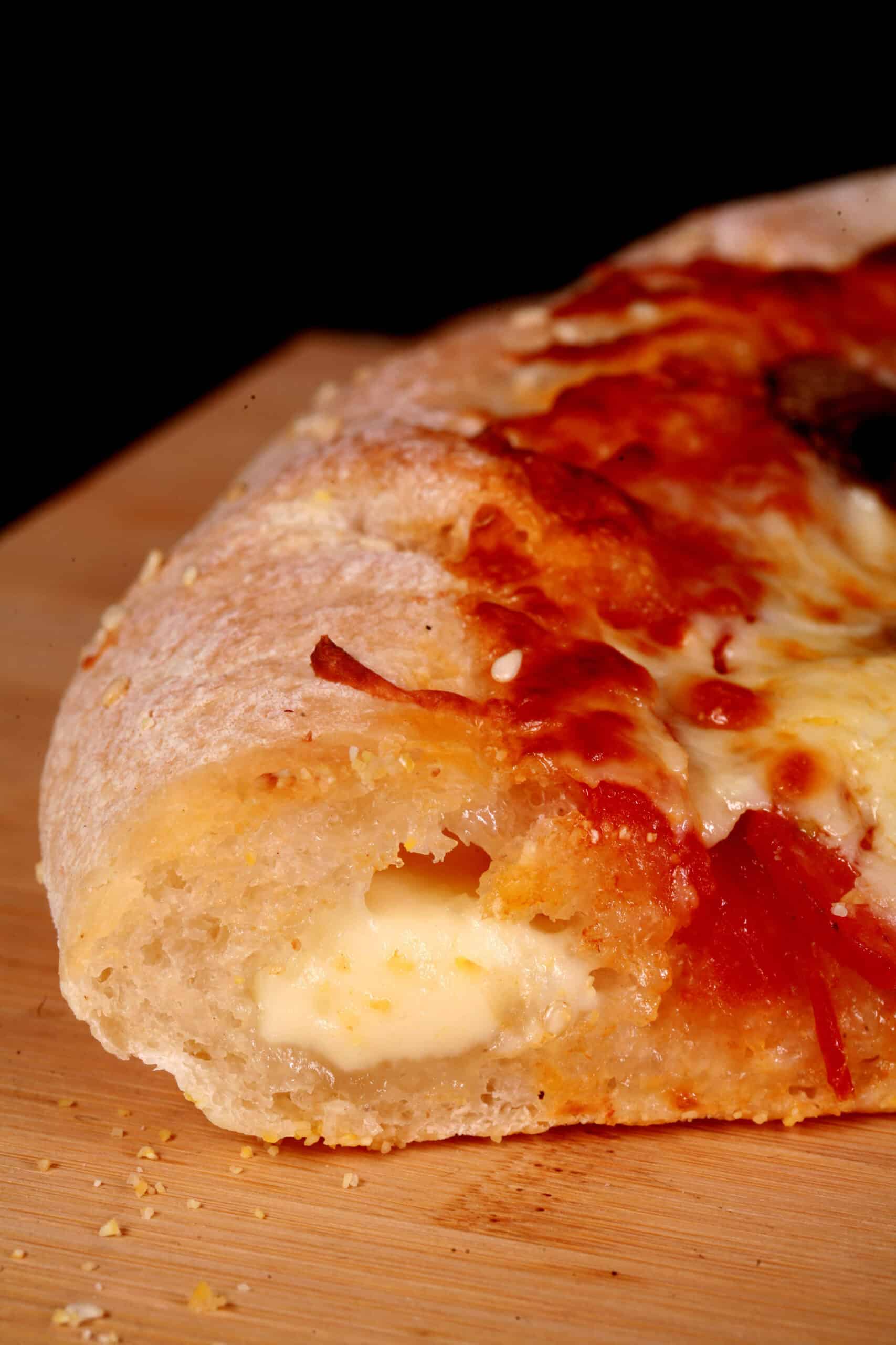 A gluten free stuffed crust pizza with pepperoni and mushrooms.
